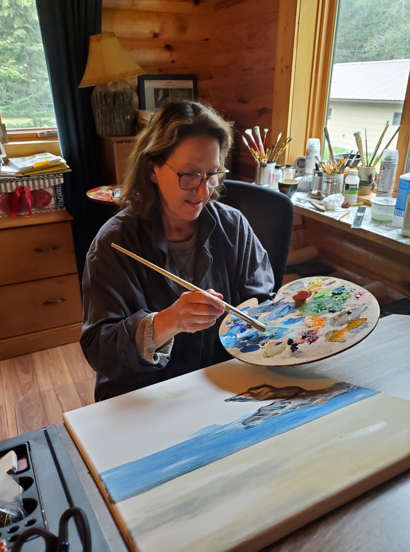 Isabelle at her easel, in her studio in Minnesota
